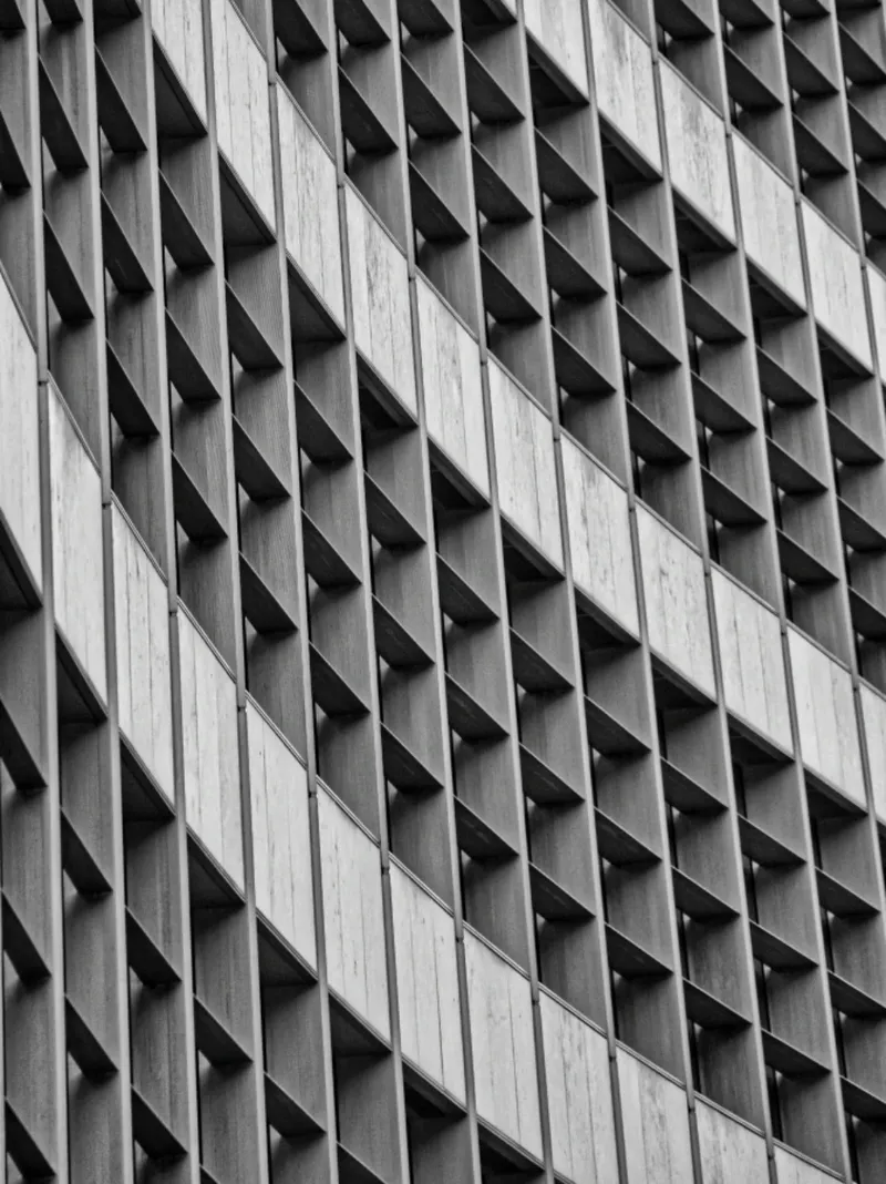 A repeating window pattern on a curved facade